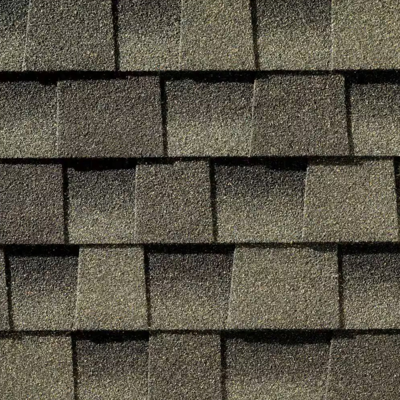 Close-up of overlapping GAF Timberline HDZ 33.33 sq. ft. per bundle laminated high definition shingles with a textured, grainy surface and built-in StainGuard Plus algae protection, arranged in a staggered pattern.